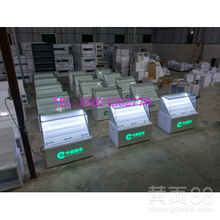 【河南許昌商場專賣店小賣部定做煙柜收銀臺一體化圖片】-
